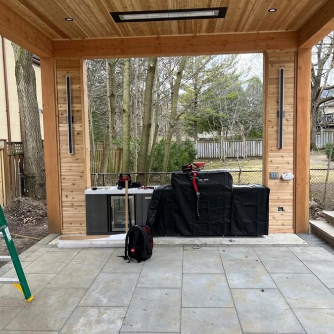 Covered patio with wood paneling Covered patio with wood paneling