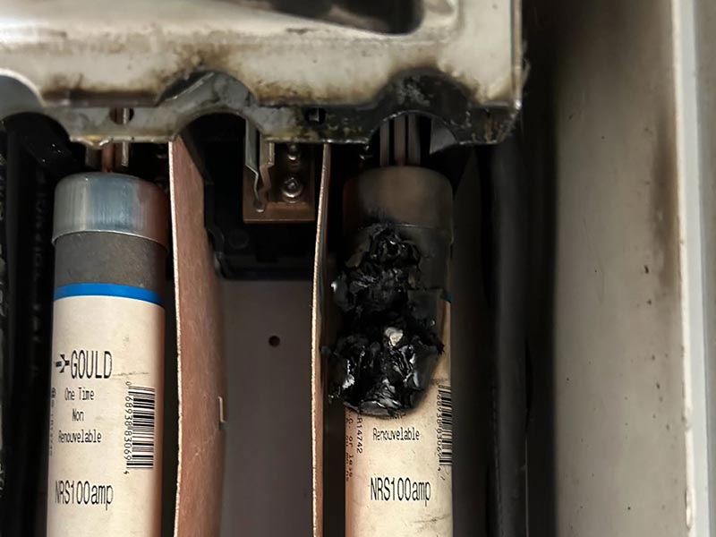 Close-up of two damaged electrical fuses Close-up of two damaged electrical fuses