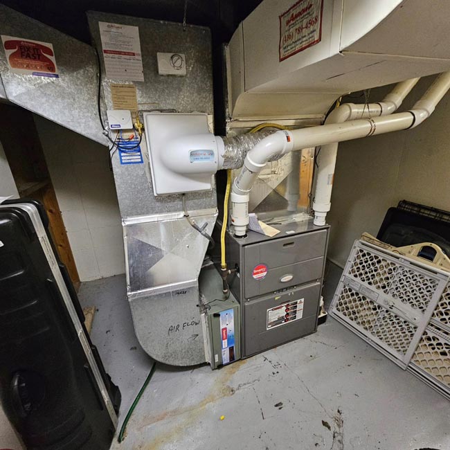 Basement furnace and duct system with pipes Basement furnace and duct system with pipes