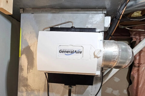 A wall-mounted General Aire humidifier