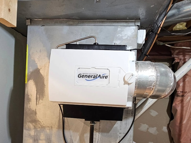 A wall-mounted General Aire humidifier A wall-mounted General Aire humidifier