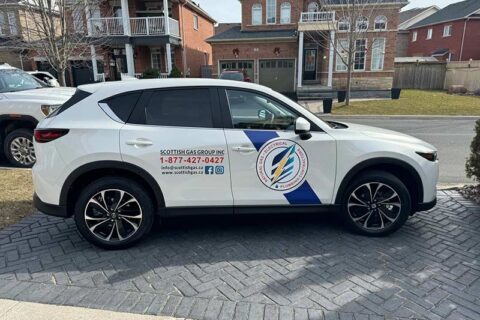 A white SUV with Scottish Gas Group Inc branding