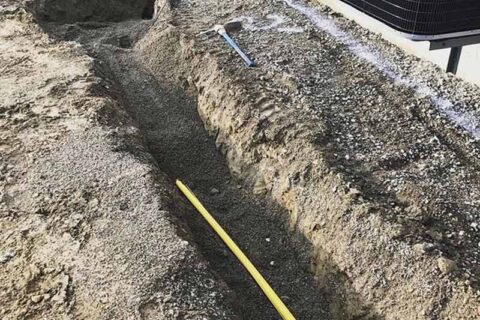 Digging a path to install a underground Gas pipe installation