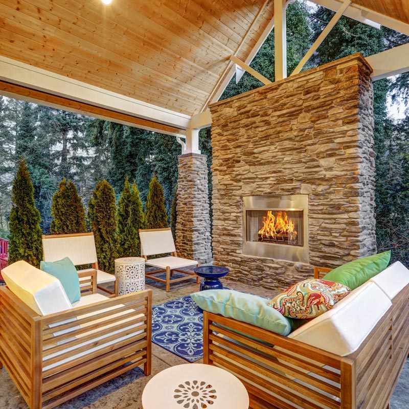 outdoor living area with gas fireplace