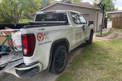 A pickup truck parked on the drive way