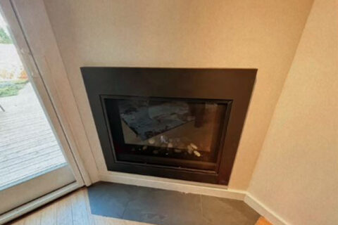 A fireplace inside the house
