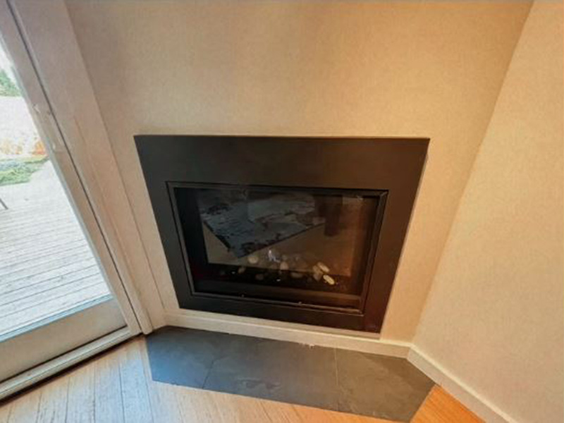 A fireplace inside the house