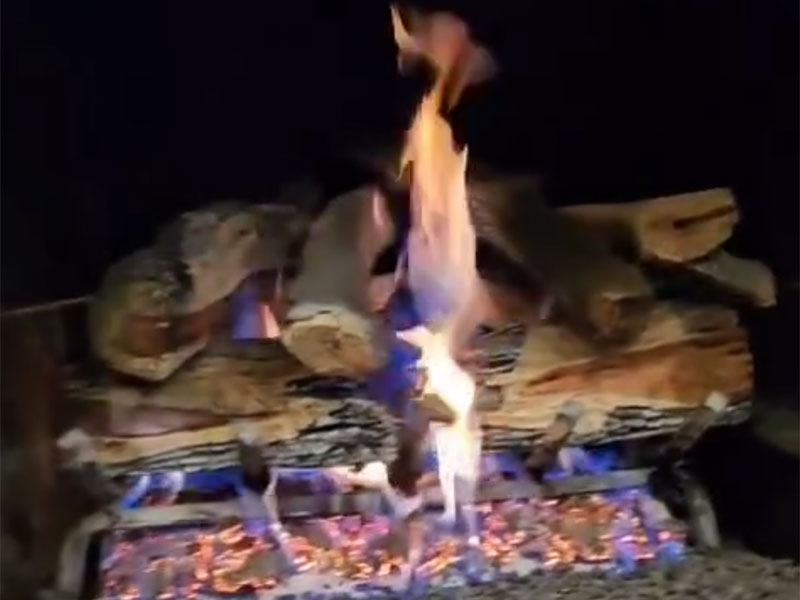 A Gas powered fireplace in the house