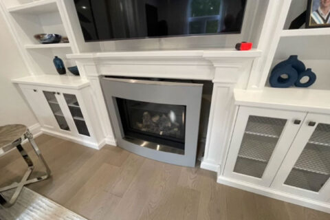 Modern living room with a silver fireplace