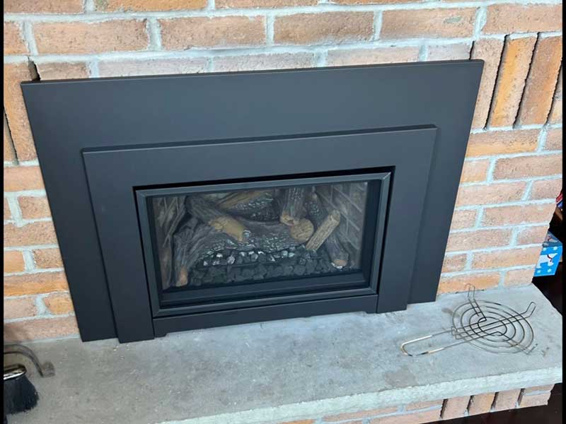 A Gas powered fireplace in the house