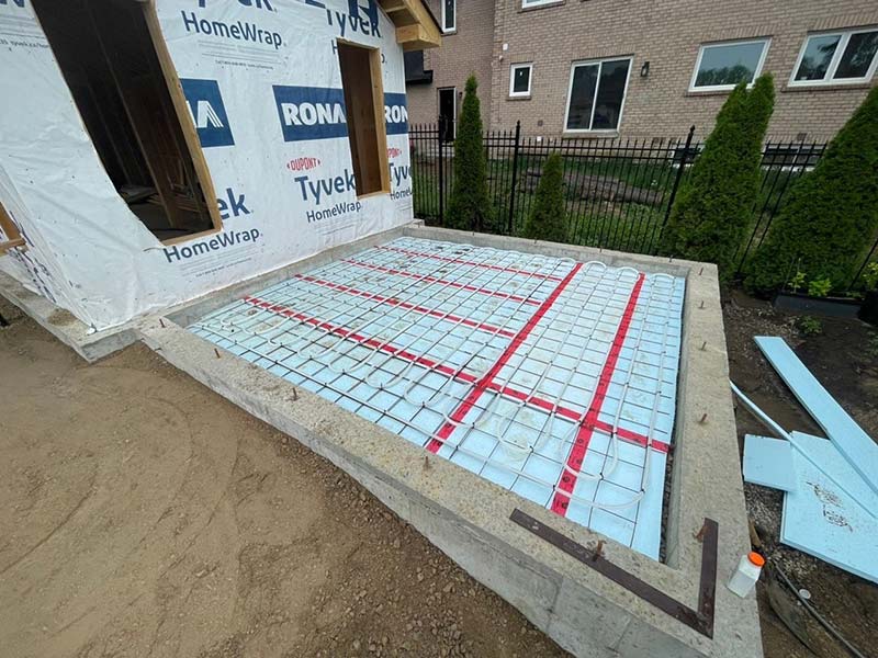 Construction site showing foundation with insulated concrete Construction site showing foundation with insulated concrete