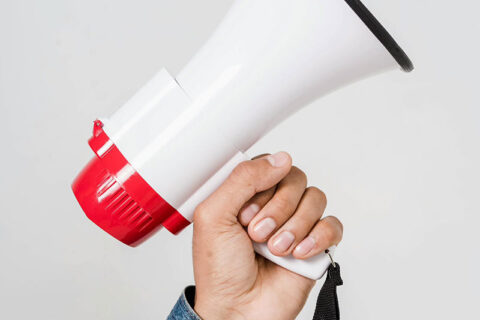 a person holding megaphone