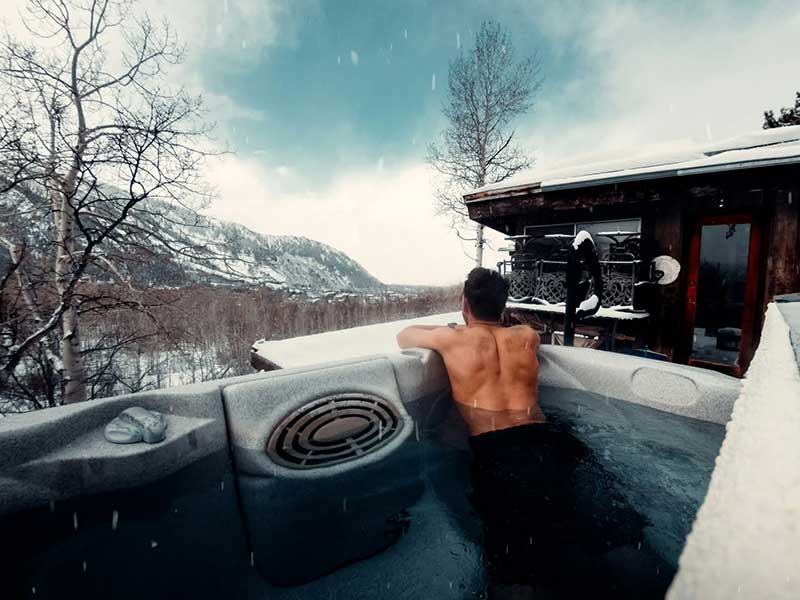A man relaxing in the pool
